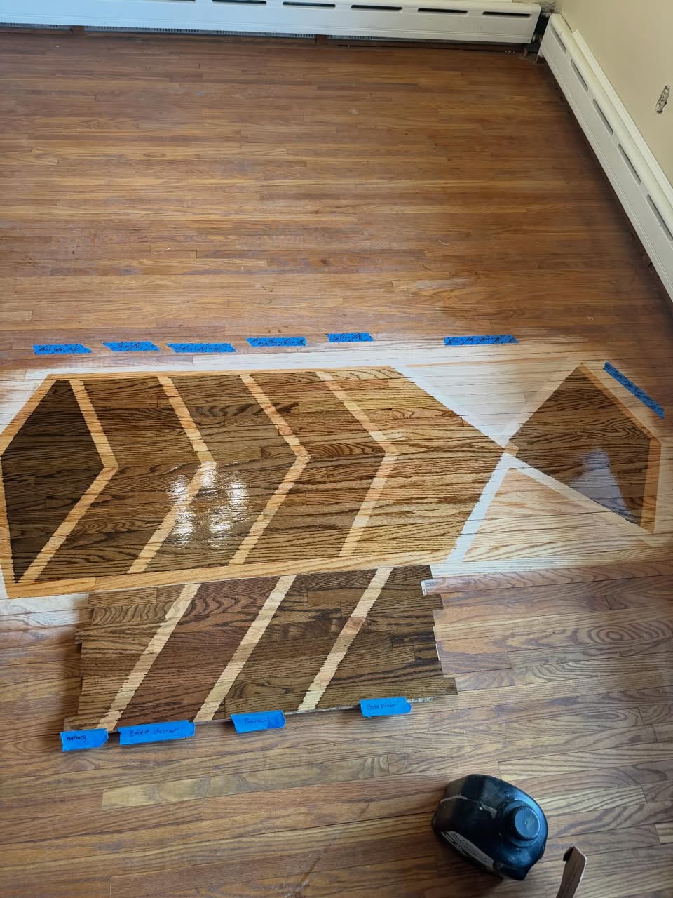 Custom hardwood stain sample options by Detail Refinishing